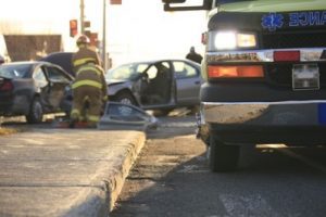 A road traffic accident where two cares have been damaged in a head-on collision.