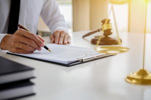 A solicitor sits at a desk ready to handle different types of personal injury claims. 