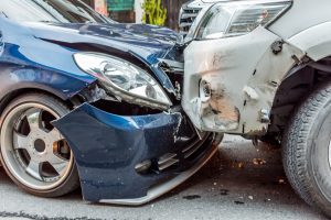 Two cars have collided in a road traffic accident.