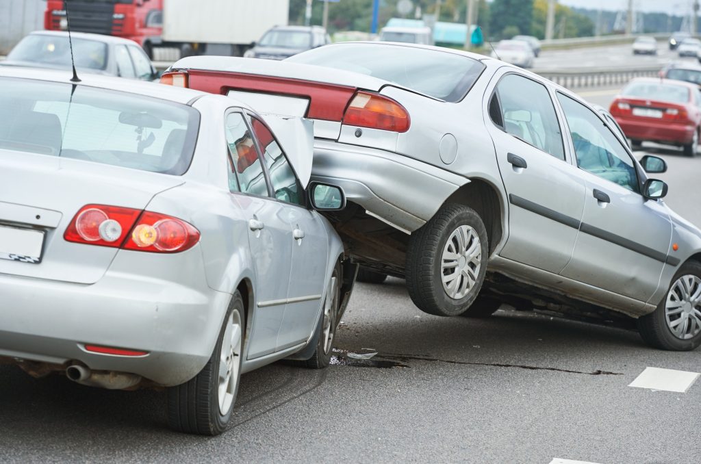 Two cars are involved in a multi-car accident. 