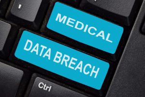 Keys on a keyboard show medical data breach.