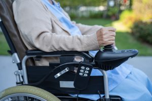 Woman riding new mobility scooter after a car collided into previous one 